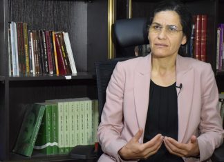 Η Ιlham Ahmed επικρίνει τον Παγκόσμιο Οργανισμό Υγείας και καλεί την κυβέρνηση της Συρίας να ενεργήσει υπεύθυνα